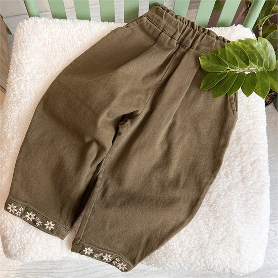 شلوار مام فیت جین کرم پاچه گلدار